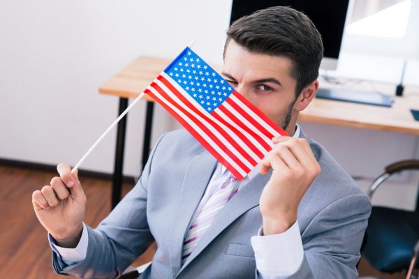 Бизнесмен с флагом США